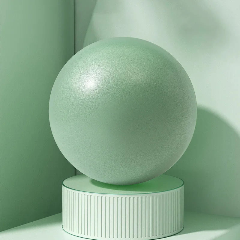 Elevate Your Fitness Game with Our Professional 25 cm Women's Anti-Burst Pilates Yoga Ball for Leg and Hip Sculpting